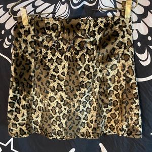 Y. B. NORMAL vintage 90s circle belt leopard print mini skirt.